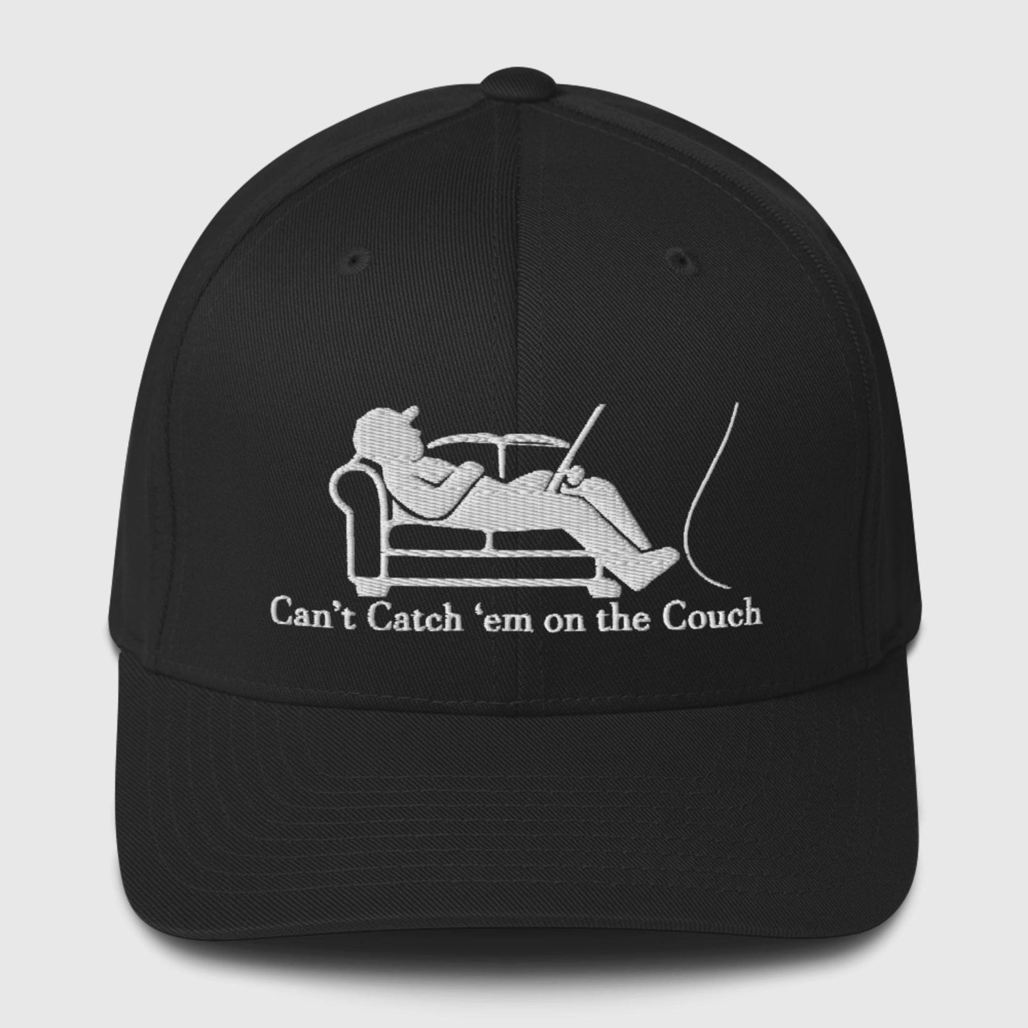 Black structured dad hat featuring couch fishing logo in white