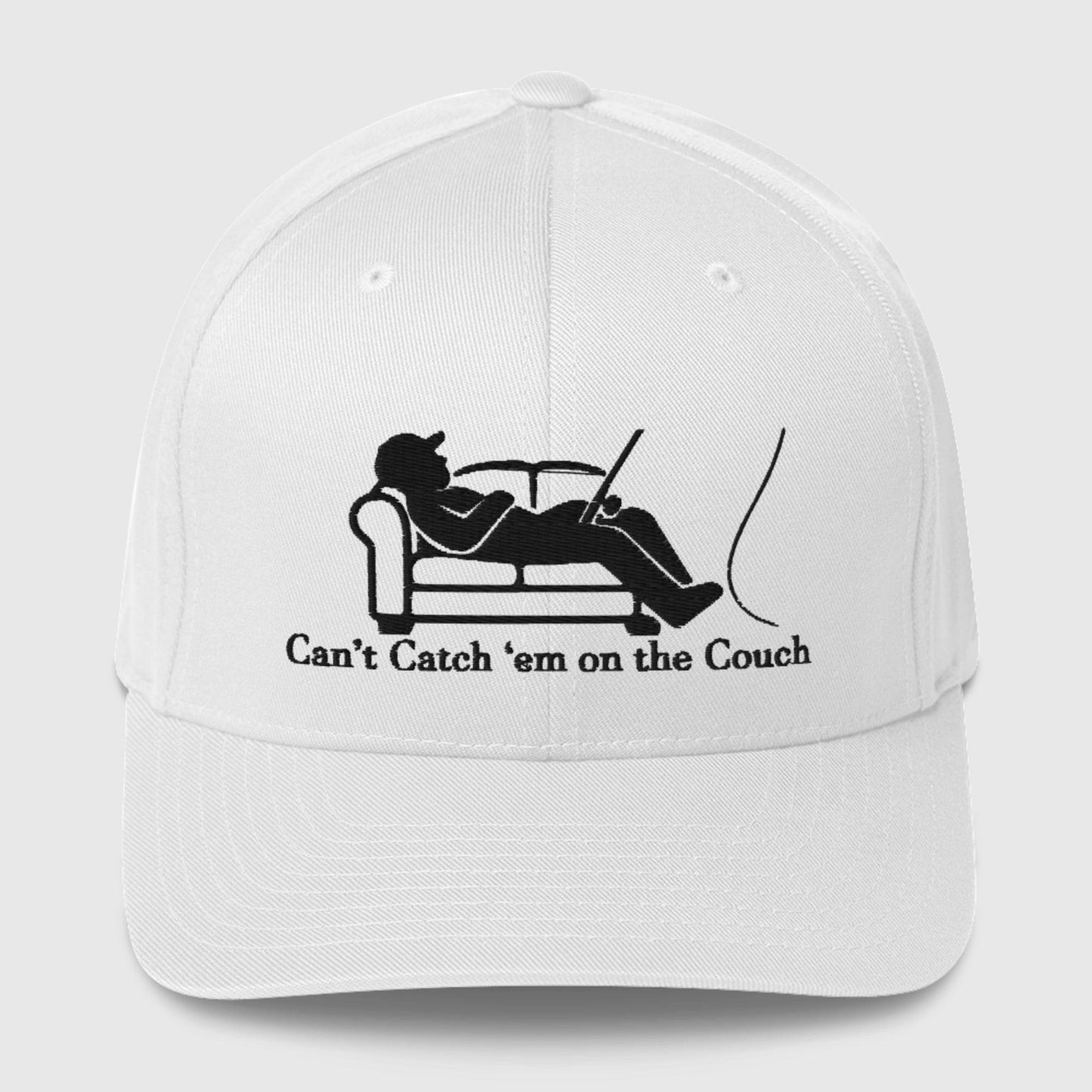 White dad hat with black couch and fisherman graphic and slogan text