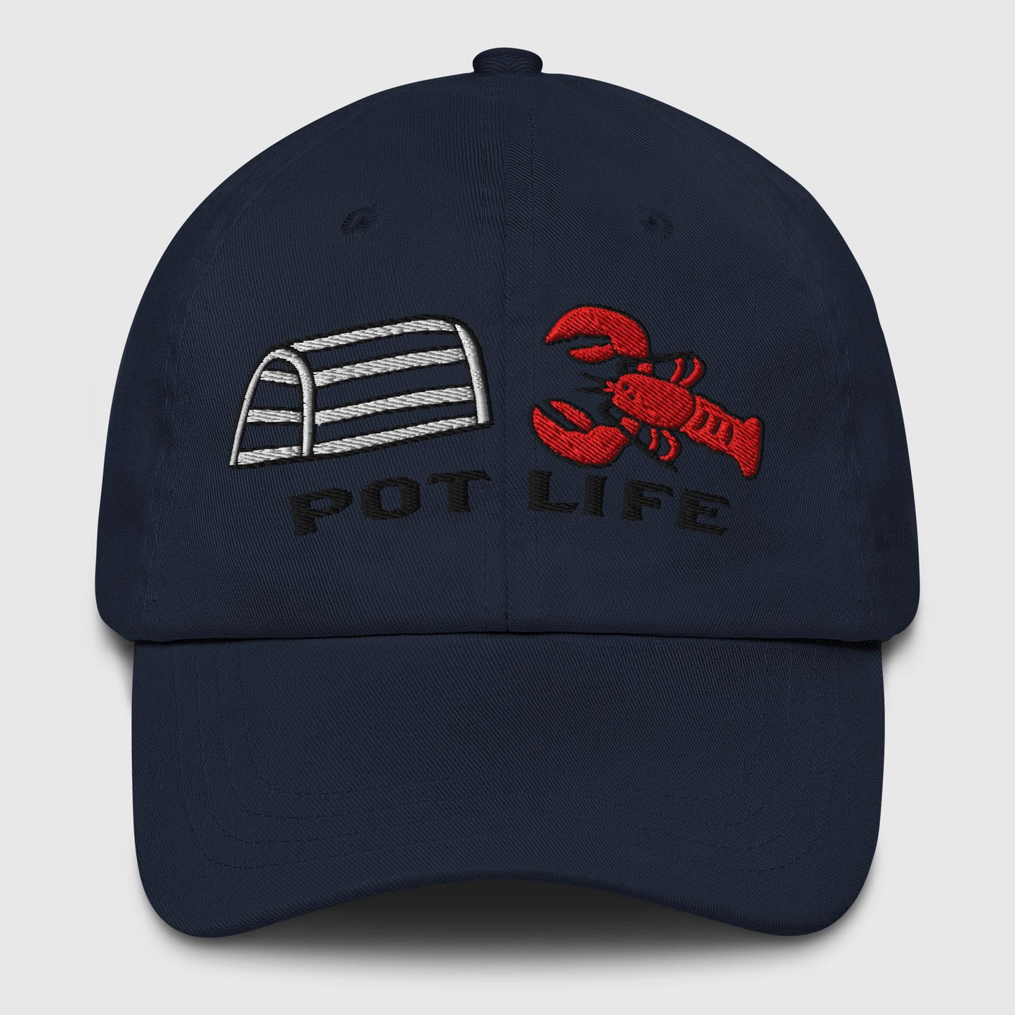 Navy dad hat with embroidered lobster trap, red lobster, and "POT LIFE" text on the front