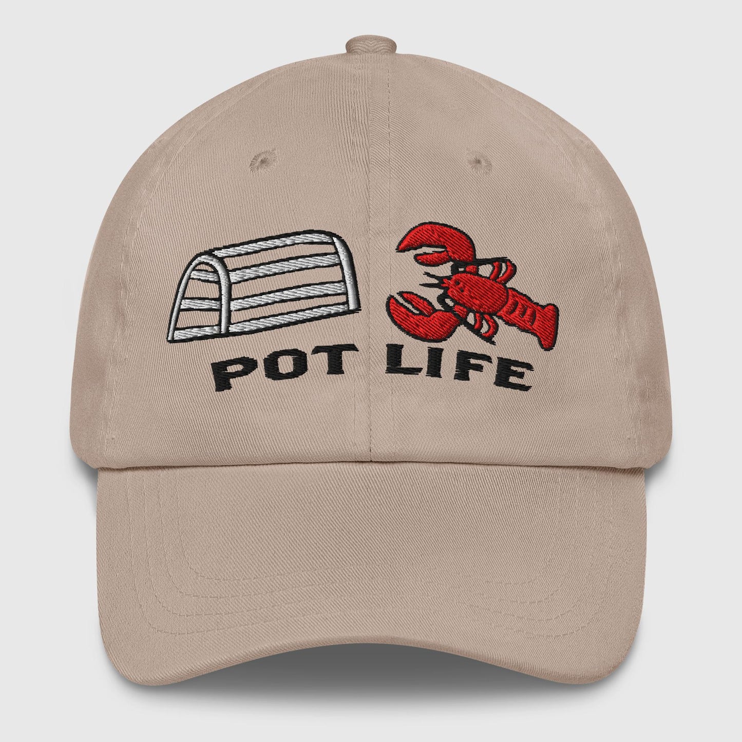 tan dad hat with embroidered lobster trap, red lobster, and "POT LIFE" text on the front