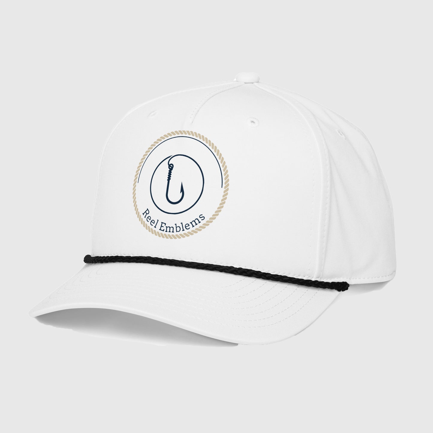 Side view of white cap with “Reel Emblems” logo and black rope