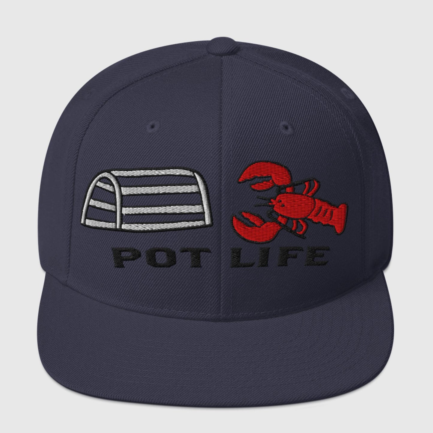 Navy snapback hat with embroidered lobster trap, red lobster, and "POT LIFE" text
