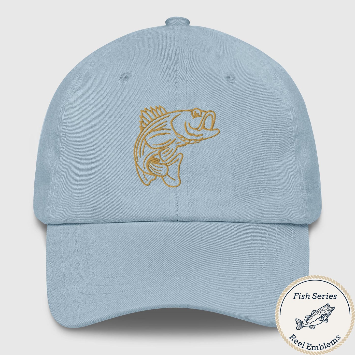 Light blue dad hat with gold embroidered bass emblem
