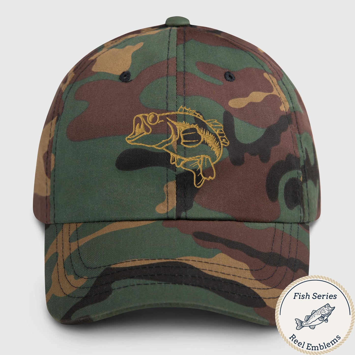 Camo dad hat with embroidered largemouth bass design in gold thread, front view