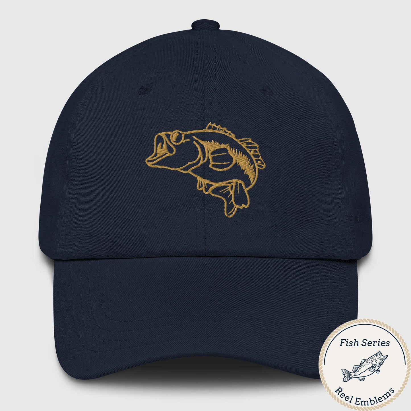 Navy dad hat with embroidered largemouth bass design in gold thread, front view