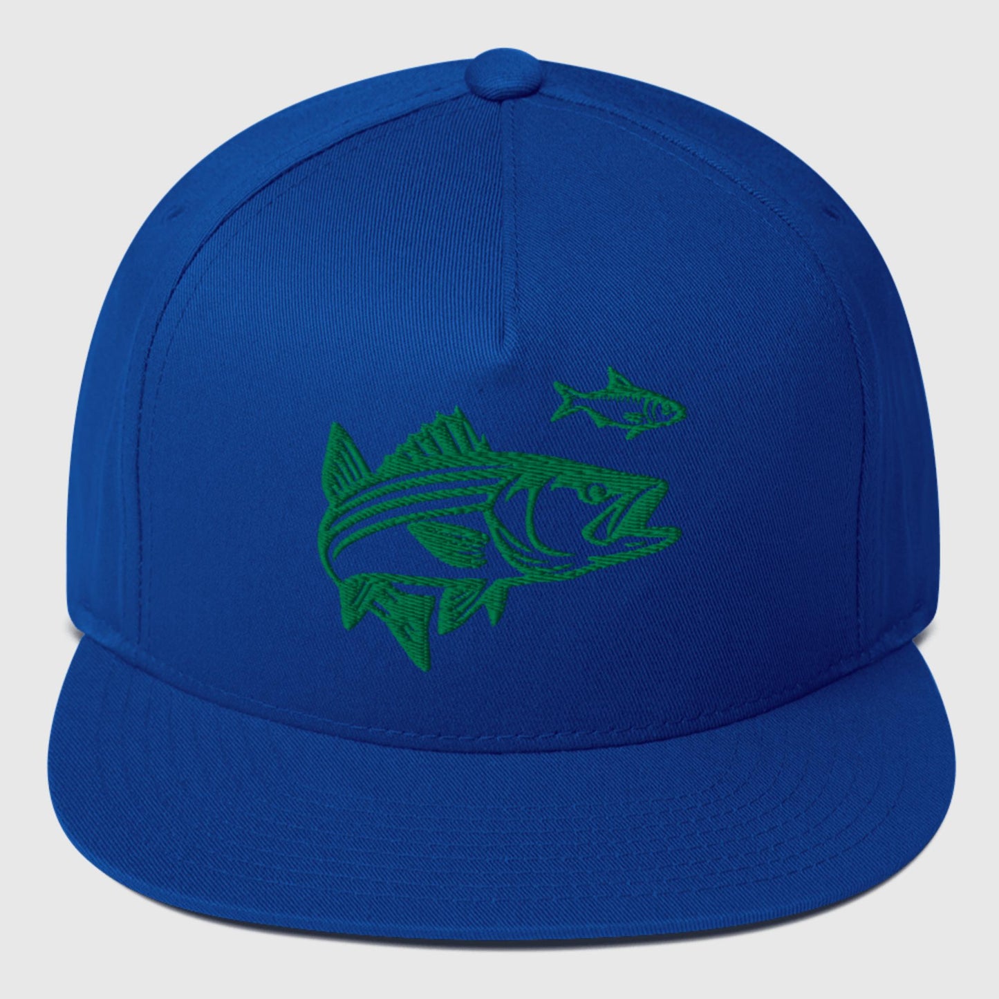 royal blue flat bill hat with green embroidered striped bass and baitfish design on front