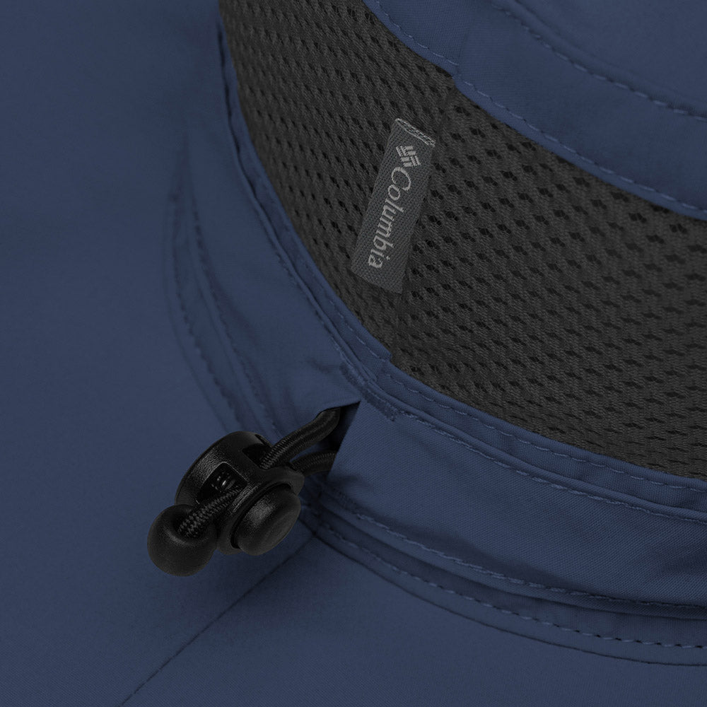 Closeup of navy Columbia bucket hat showing mesh ventilation and adjustment toggle