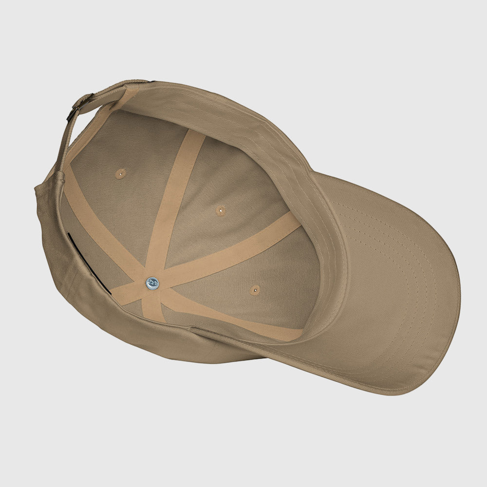 Khaki dad hat inside view showing stitched panels and adjustable strap opening