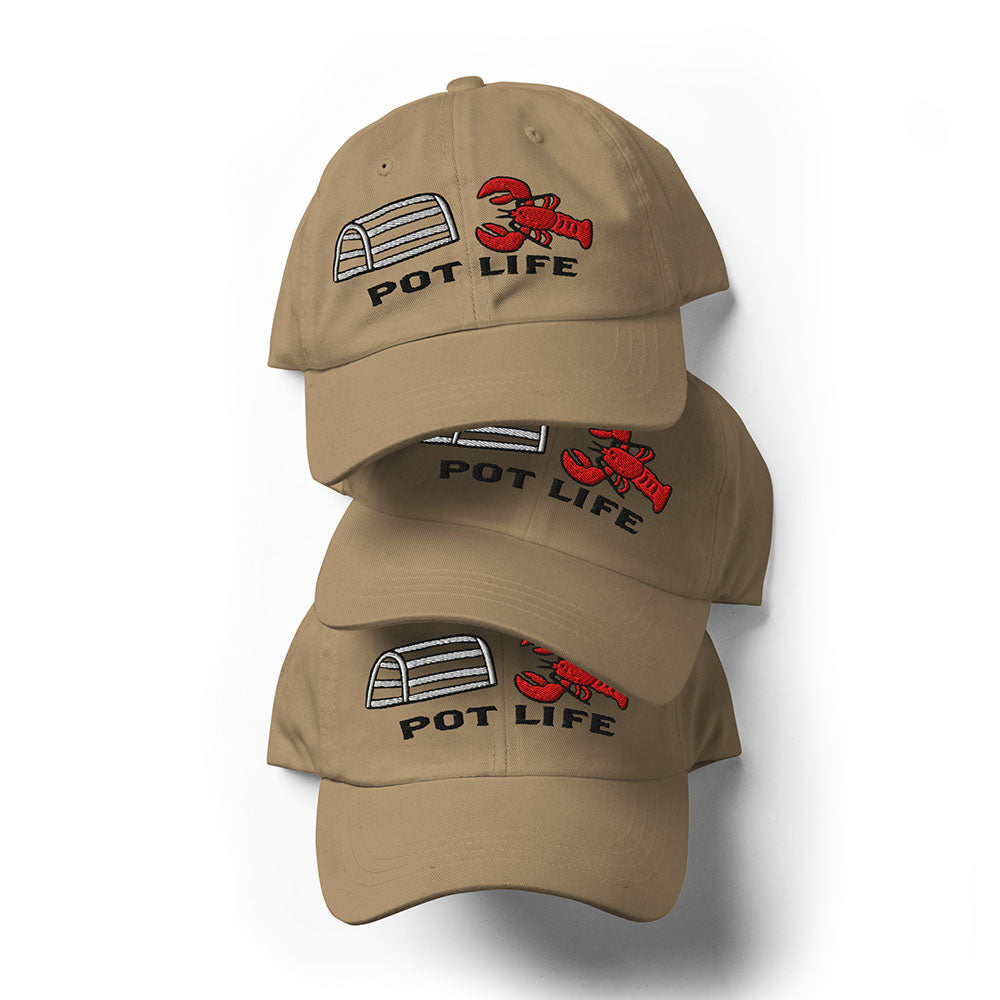Three stacked khaki dad hats with lobster trap, red lobster, and "POT LIFE" embroidery