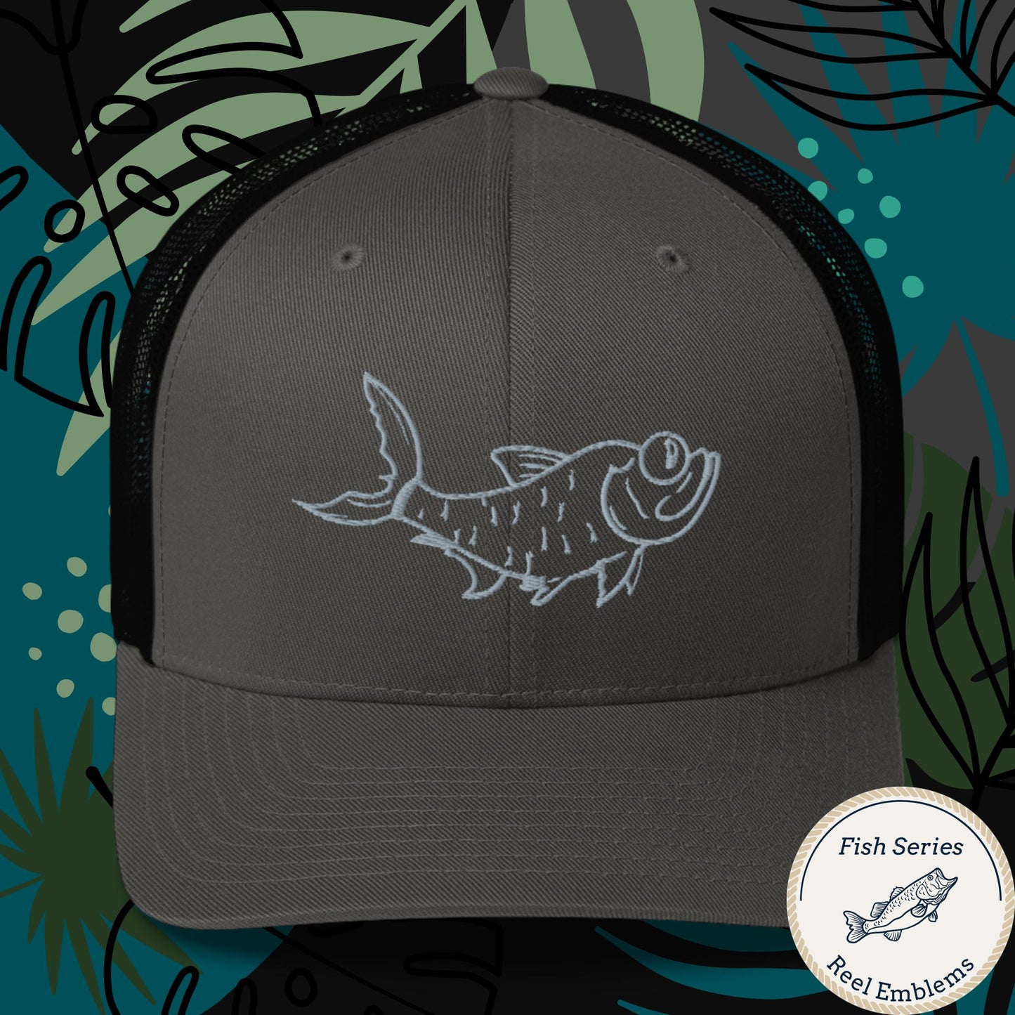 Charcoal and black fishing trucker hat with embroidered tarpon fish design and mesh back, front view