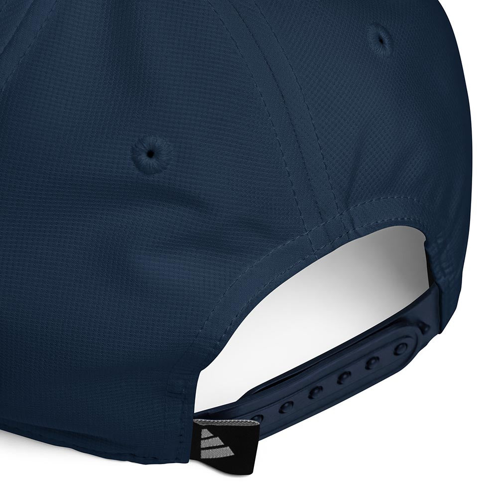 Close-up of navy Adidas performance cap back with adjustable snap strap and adidas tag