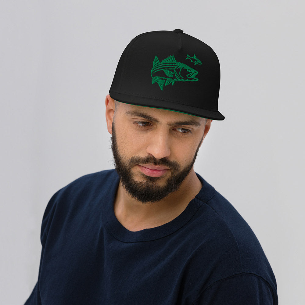 man wearing black snapback hat with green striper fish embroidery