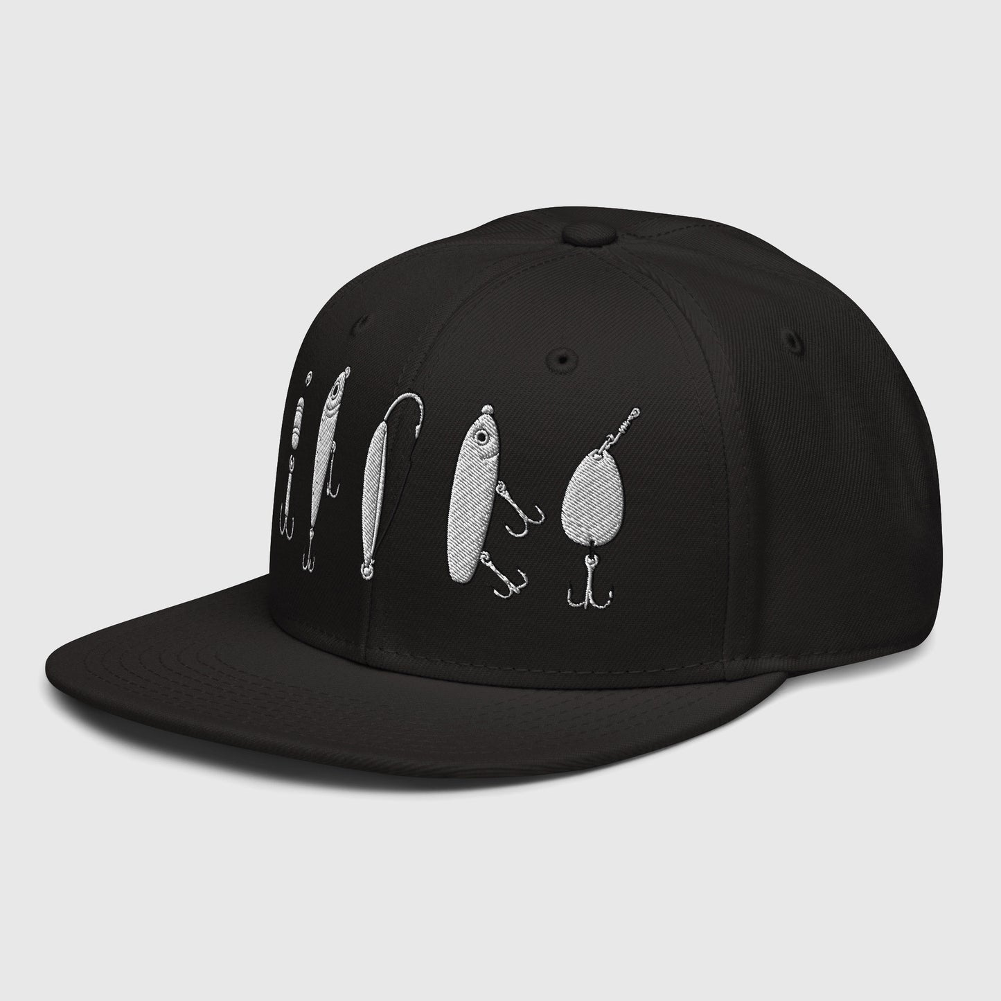Side profile of black snapback showing five embroidered fishing lures