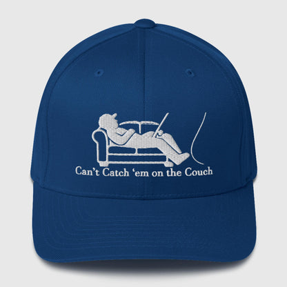Dark navy structured fishing hat with funny graphic of person fishing on couch and text "Can't Catch 'em on the Couch". - Can't Catch 'Em Structured Ball Cap - Dark