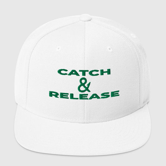 White snapback hat with green "Catch & Release" text, front view
