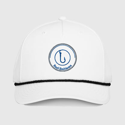 White fishing hat with black rope trim and blue Reel Emblems logo patch featuring a fishing hook, funny fishing hat design. - Reel Emblems Logo Classic Rope Cap
