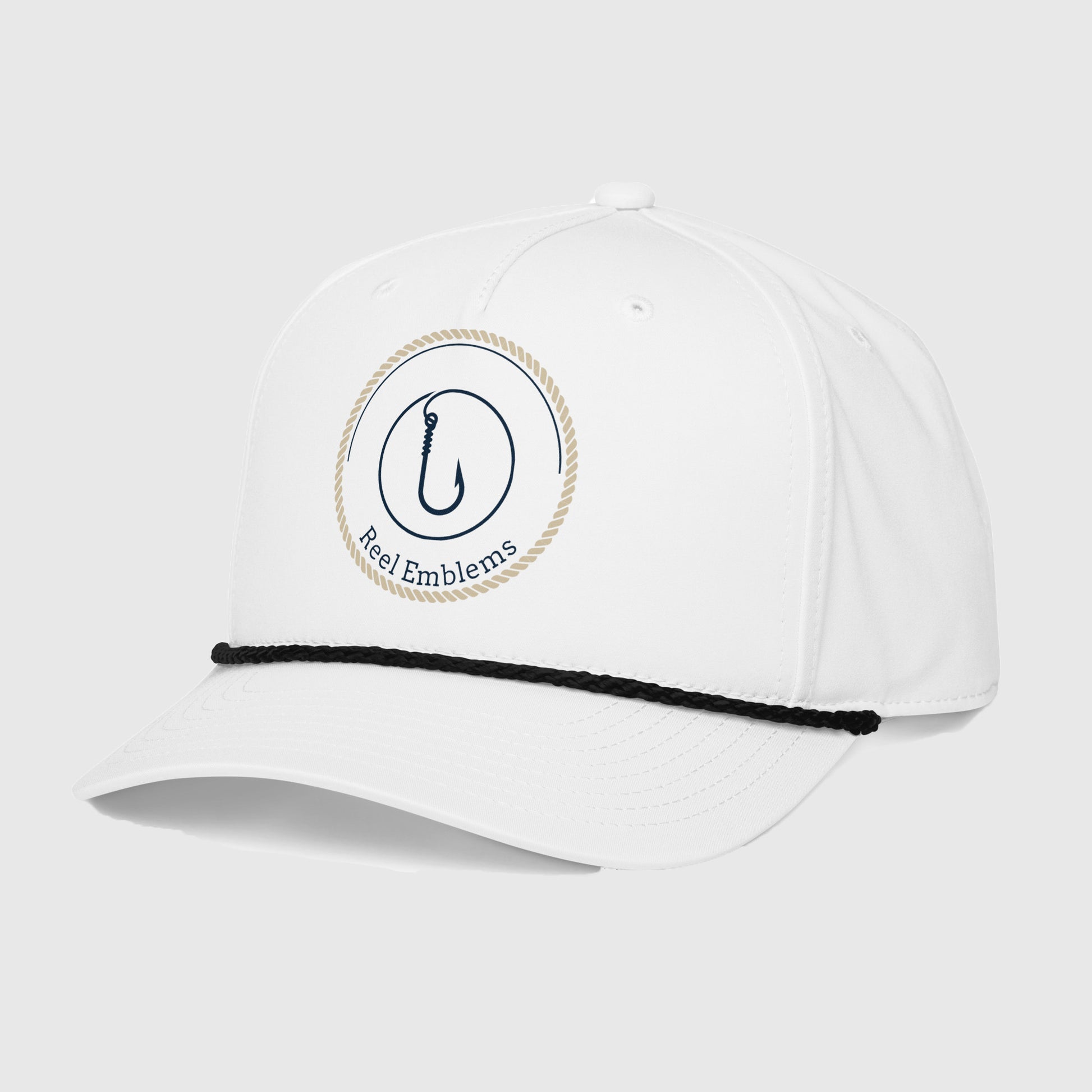 Side view of white cap with “Reel Emblems” logo and black rope
