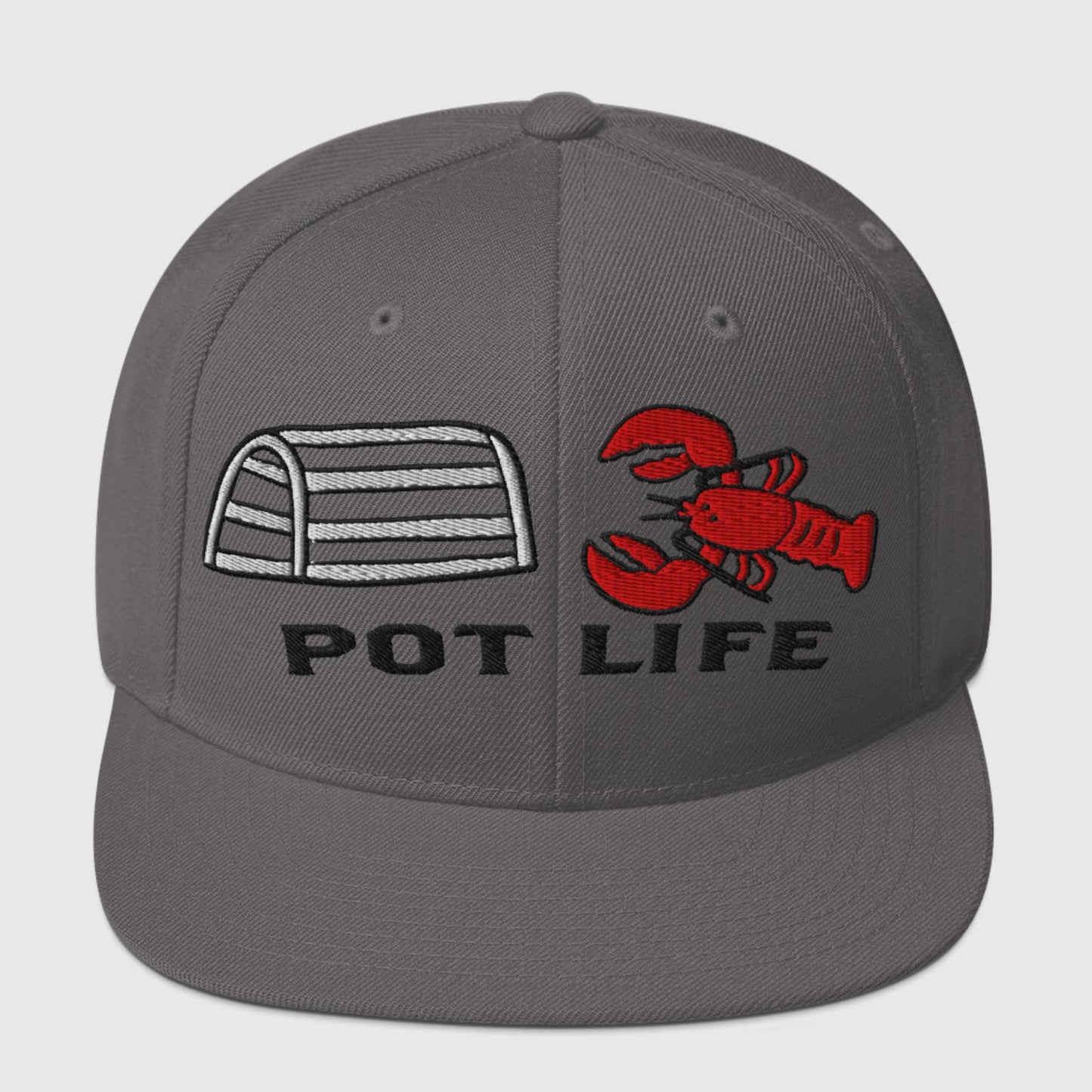 Dark grey snapback hat with embroidered lobster trap, red lobster, and “POT LIFE” text on the front