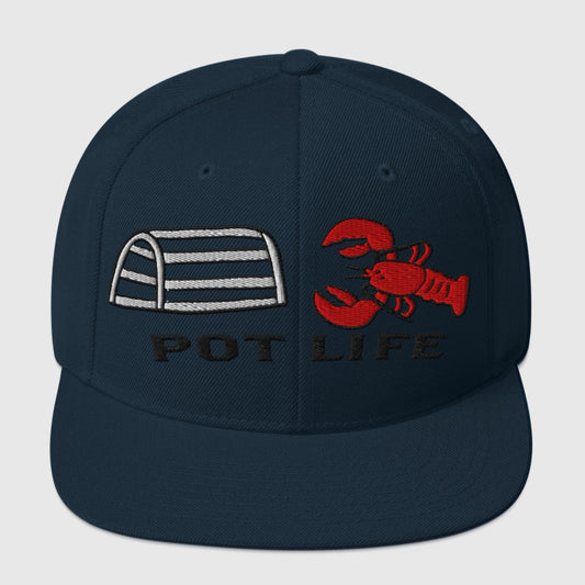Dark navy snapback hat with embroidered lobster trap, red lobster, and “POT LIFE” text on the front