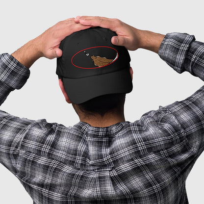 Black dad hat with humorous halibut fishing graphic embroidered on back, fishing hat. - Halibut Chase Dad Hat