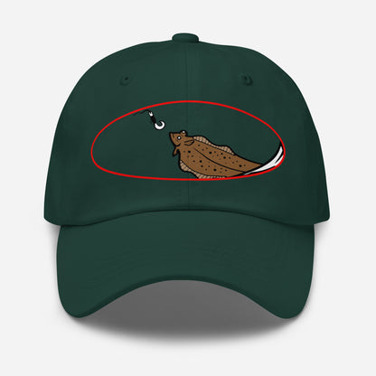 Dark green fishing hat with a funny graphic of a hooked halibut on the front. - Halibut Chase Dad Hat