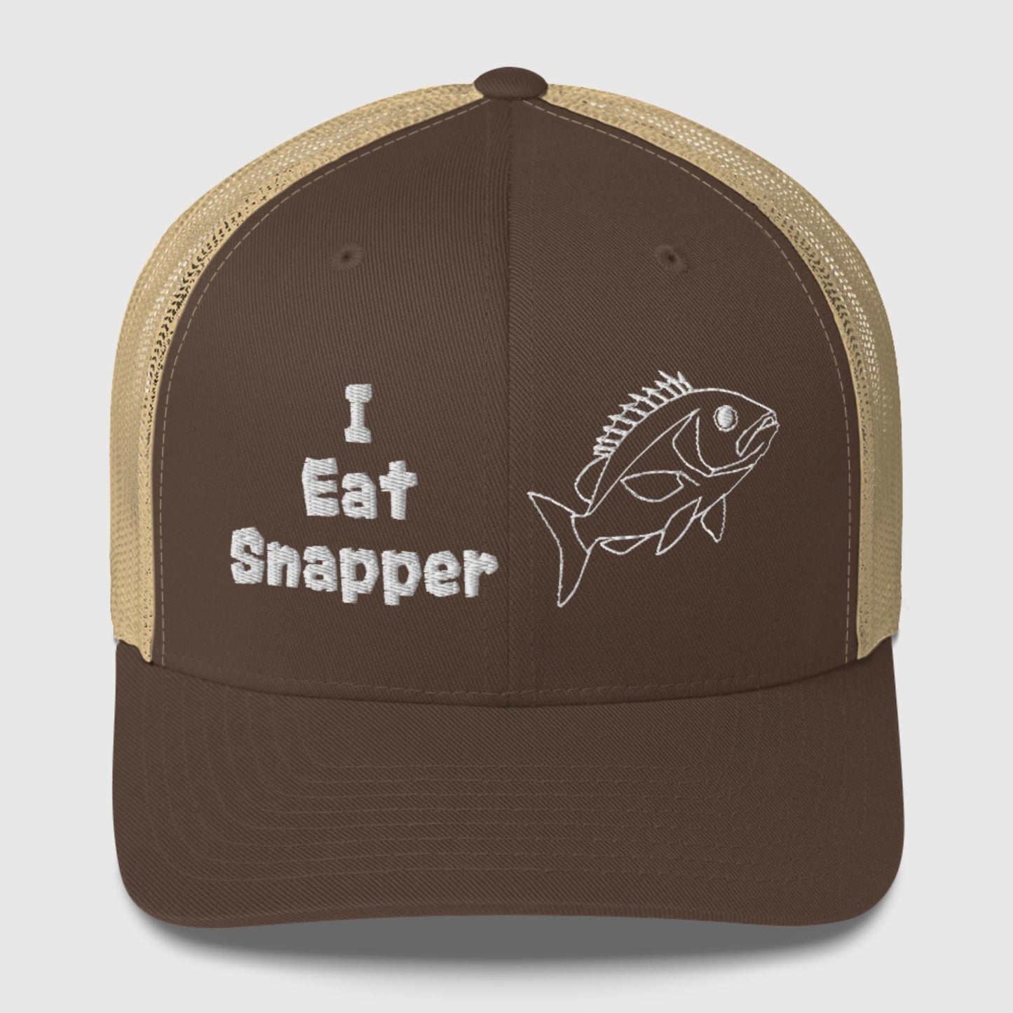 Brown mesh back trucker cap with white “I Eat Snapper” text and fish embroidery, front view