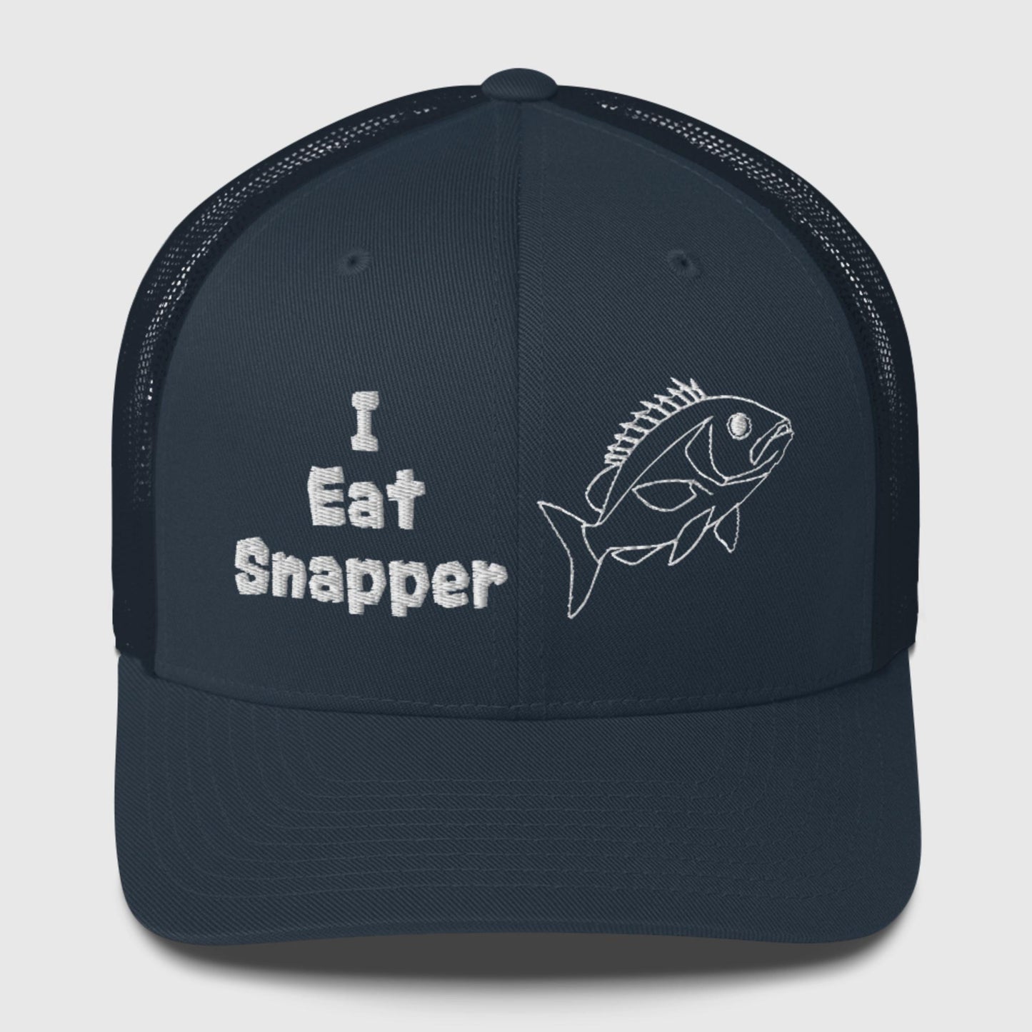 Navy mesh back trucker cap with white “I Eat Snapper” text and fish embroidery, front view