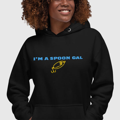 Black hoodie with "I'm a Spoon Gal" text and yellow fishing lure graphic, funny fishing hat theme. - Spoon Gal Hoodie
